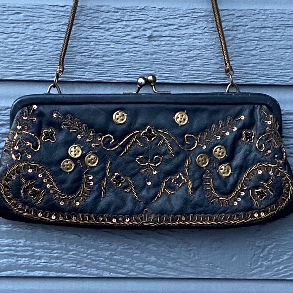 Stunning leather deco-style clutch bag
